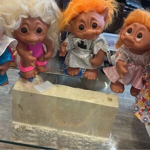 Charming Troll Doll Trio with Colorful Hair
1977 Vintage